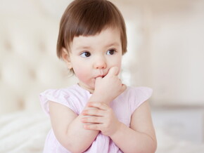 Baby girl sucking thumb Baby girl sucking thumb