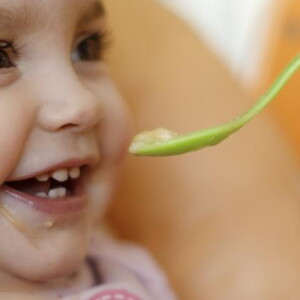 spoon feeding baby spoon feeding baby