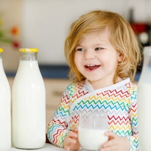 Toddler drinking cows milk