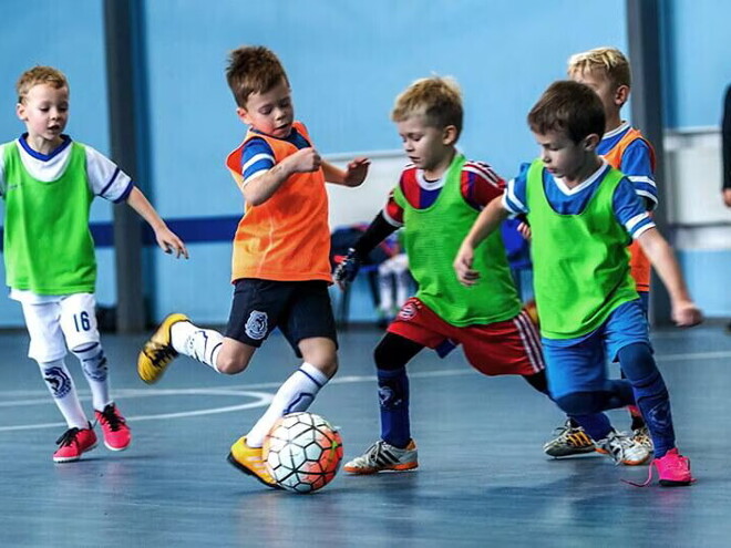 Kids playing football